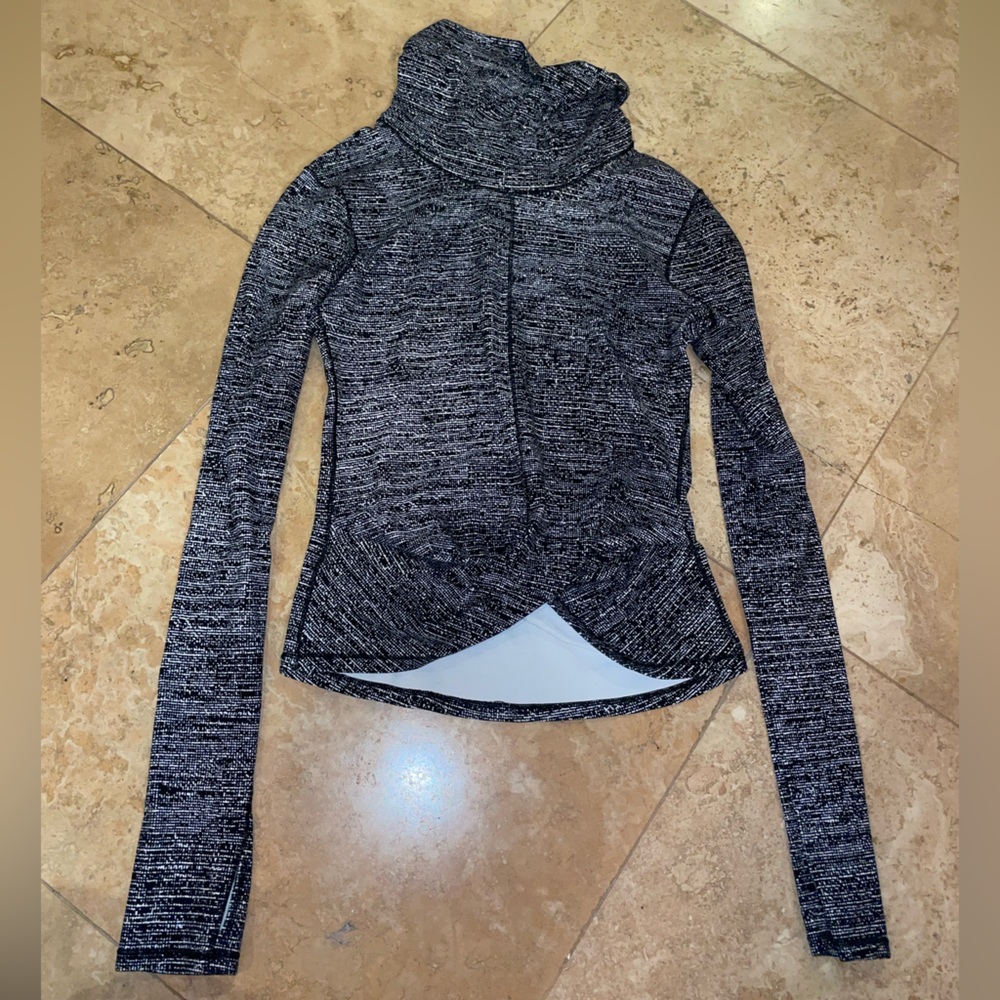 Lulu lemon, Black and White Spotted. High neck open in the front. Size 4